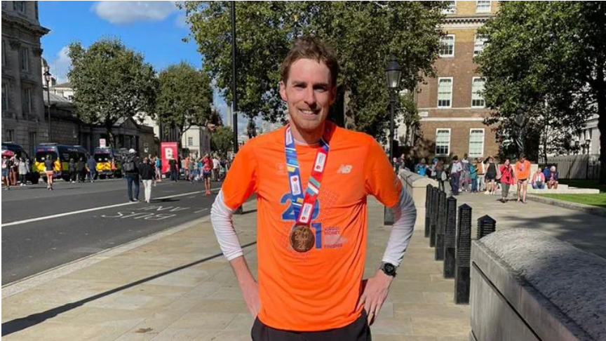 Marc Adams, Senior UK Supply Chain Development Manager, proudly wearing his medal after completing the 2021 London Marathon.